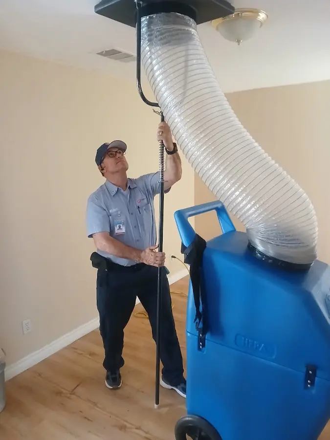 HVAC Installation technician using HEPA equipment in Kill Devil Hills